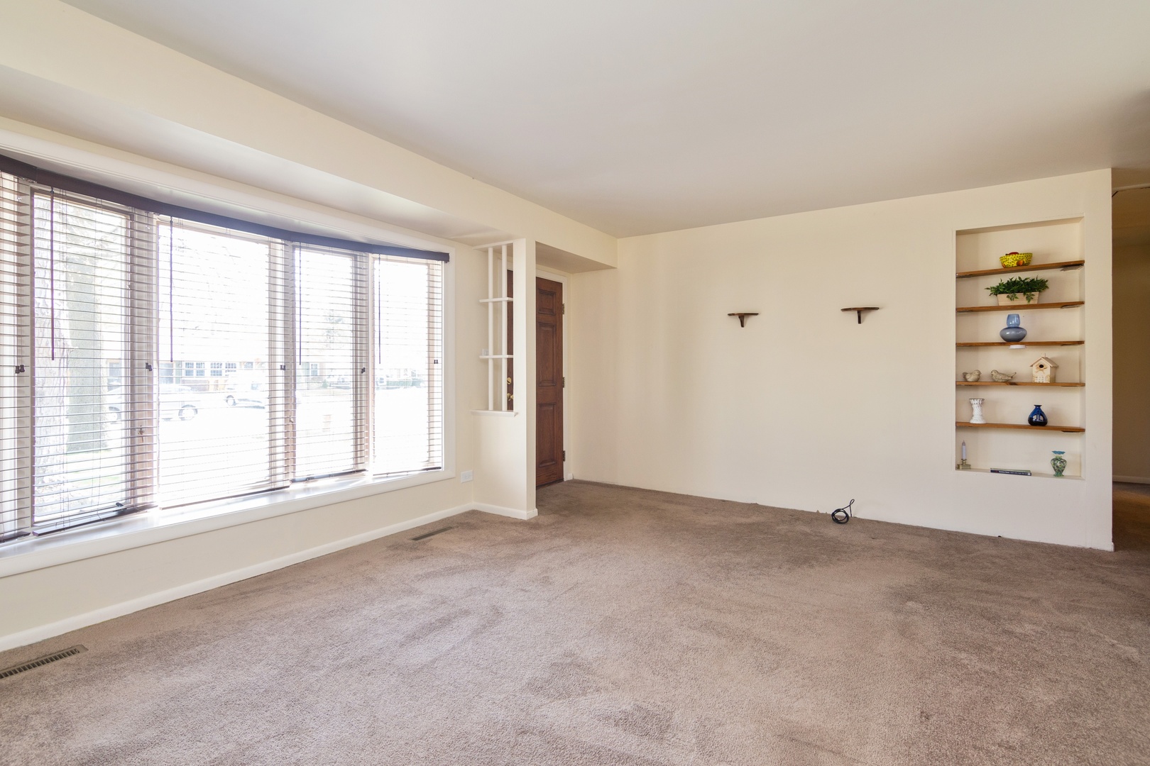 812 Meadow Road Northbrook, IL 60062 - Photo 2 of 10 a view of an empty room with a window