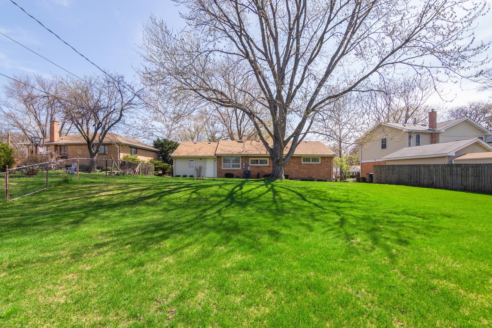 812 Meadow Road Northbrook, IL 60062 - Photo 10 of 10 a view of a house with a back yard