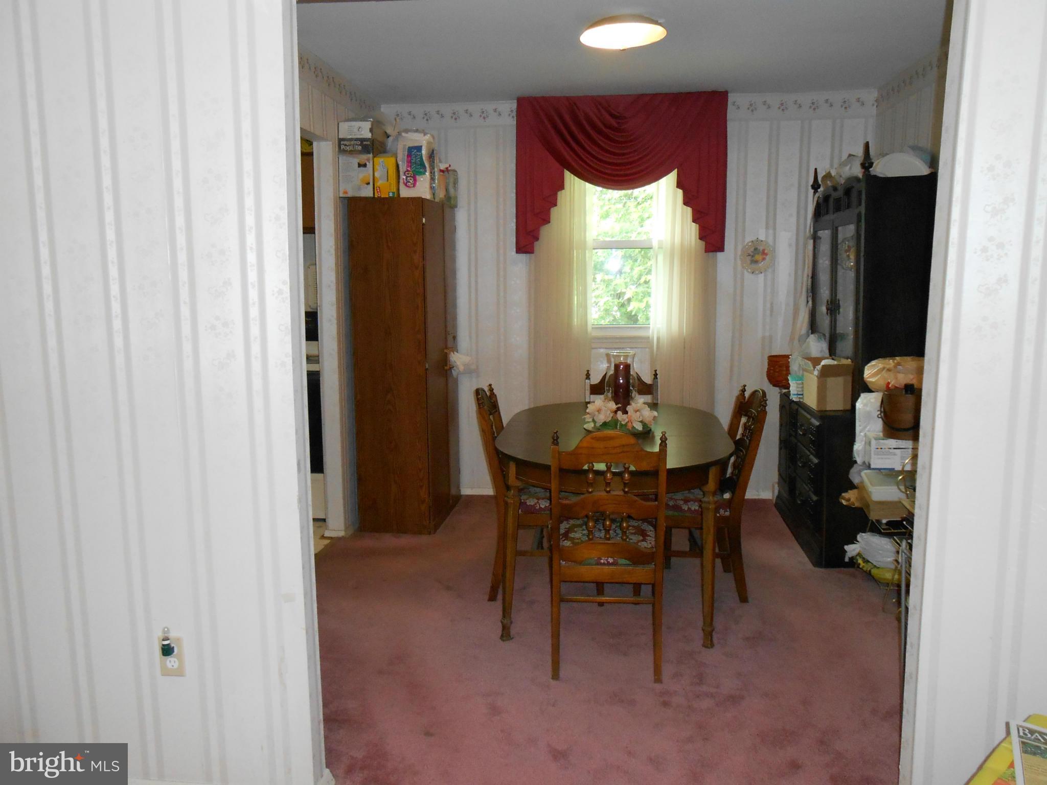 1310 Jewell Road Dunkirk, MD 20754 - Photo 4 of 9 a dining room with furniture and window