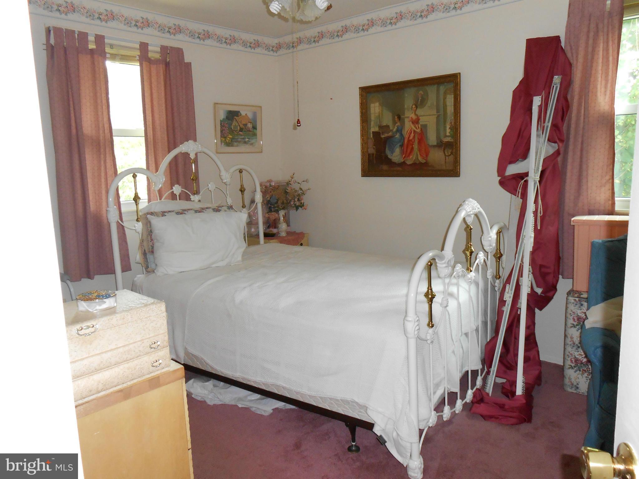 1310 Jewell Road Dunkirk, MD 20754 - Photo 6 of 9 a bed room with a bed and a window