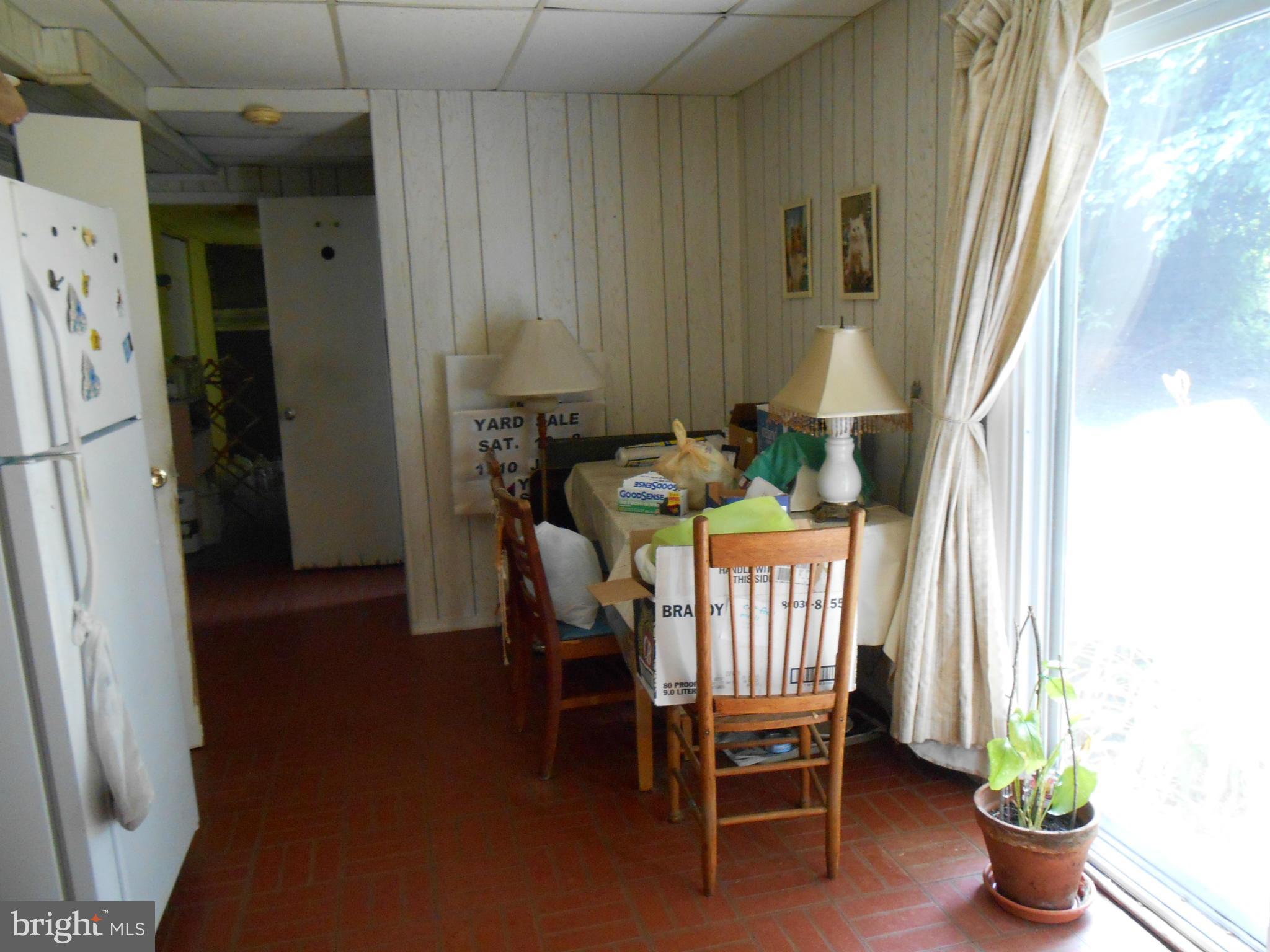1310 Jewell Road Dunkirk, MD 20754 - Photo 8 of 9 a dining room with furniture and window