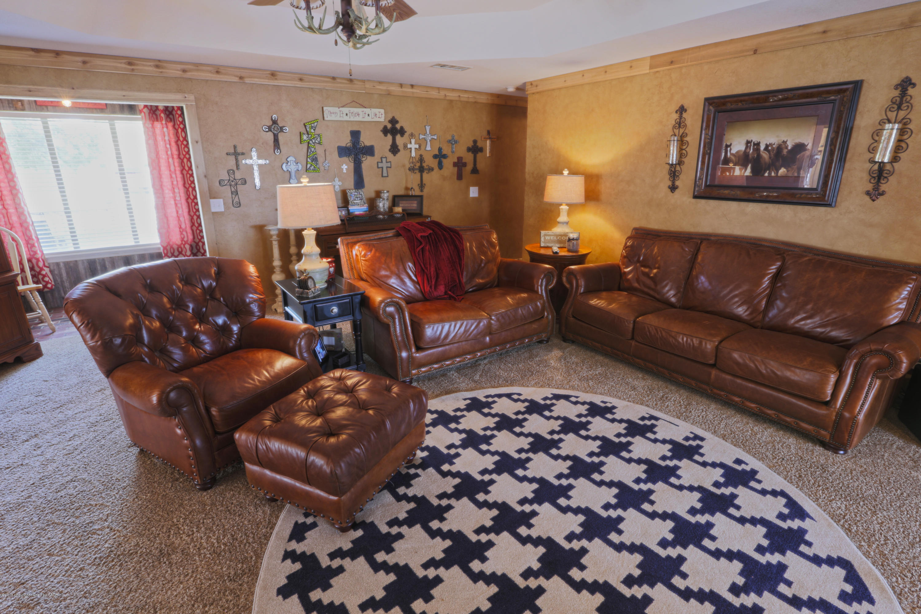8409 Goodnight Trail Amarillo, TX 79110 - Photo 14 of 33 a living room with furniture and a rug