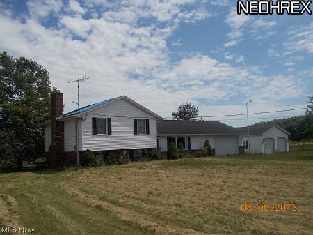 1742 Doyle Road Jefferson, OH 44047 - Photo 1 of 13 Jefferson Township Split Level setting on 2.12 acres. 3 bedrooms, 1.5 baths, modern kitchen, formal diningroom, 2 car attached, and a 2 car detached garage