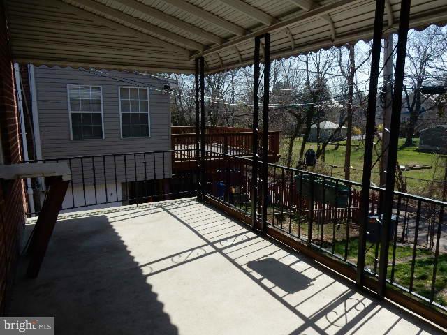 314 Westshire Road Baltimore, MD 21229 - Photo 13 of 15 Step Out from Kitchen to Balcony