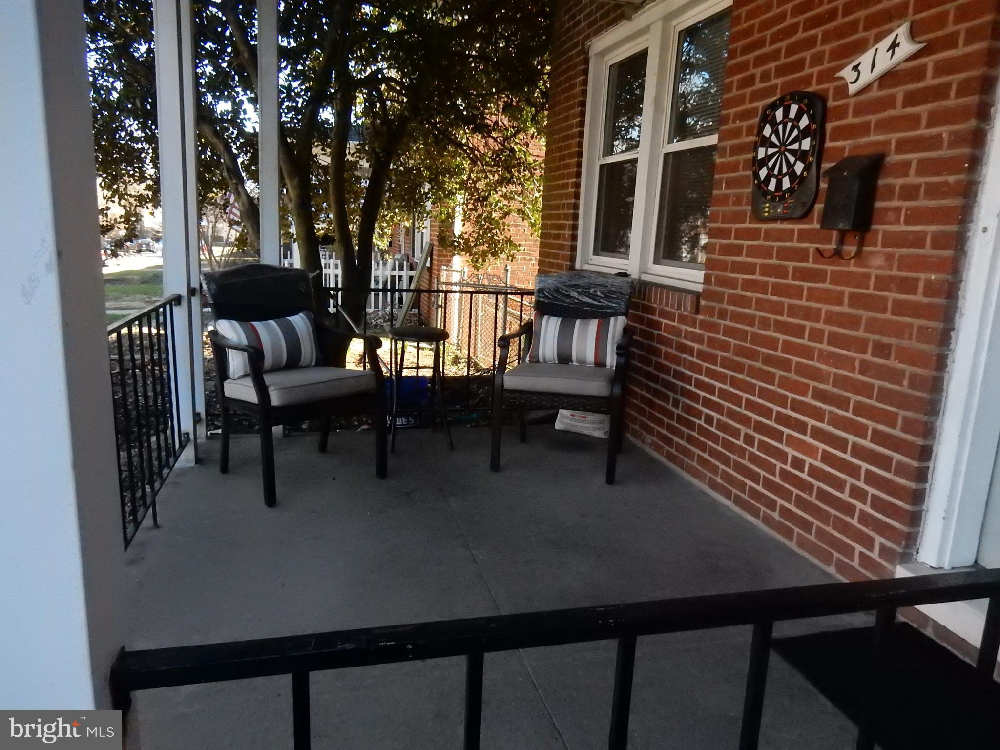 314 Westshire Road Baltimore, MD 21229 - Photo 14 of 15 Enjoy the porch on nice evenings! Why not?