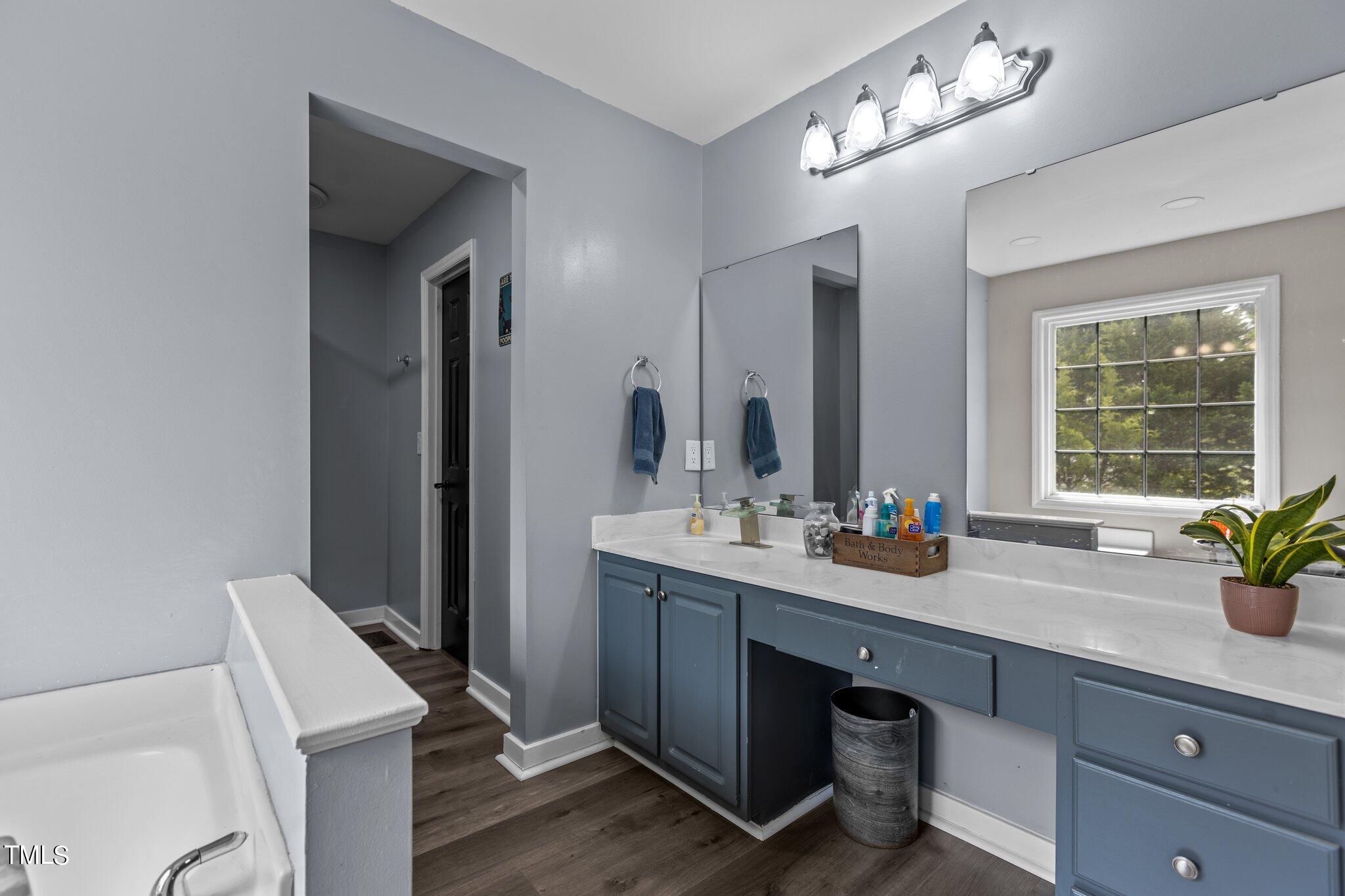810 Willie Gray Road Timberlake, NC 27583 - Photo 16 of 28 a view of bathroom with sink and mirror