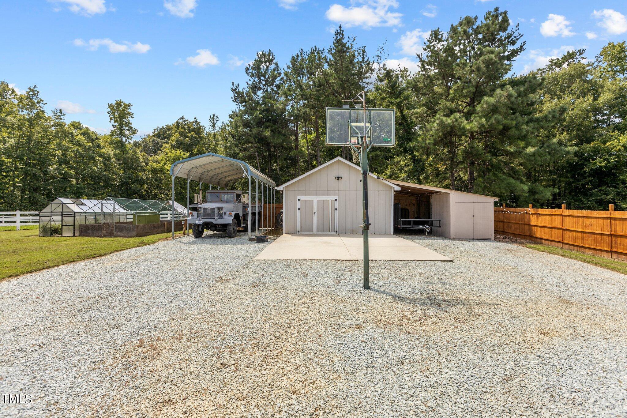 810 Willie Gray Road Timberlake, NC 27583 - Photo 23 of 28 a house view with a outdoor space
