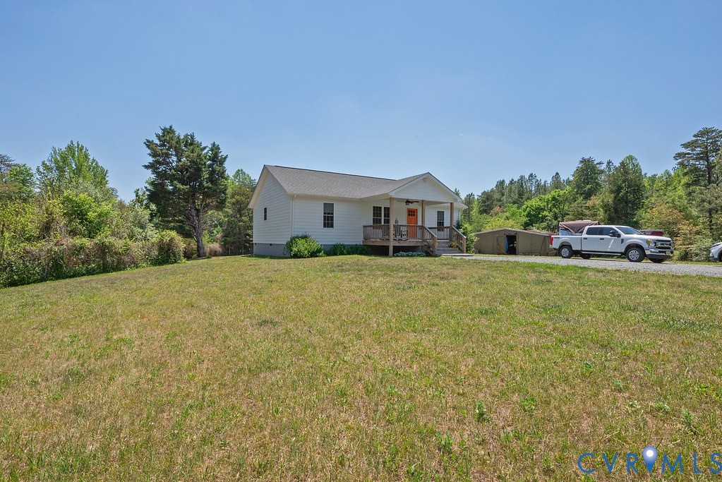 4336 Hells Bend Road Palmyra, VA 22963 - Photo 29 of 35 White siding residence featuring a covered front p