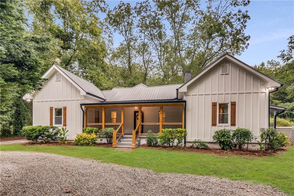 1959 Bold Springs Road Monroe, GA 30656 - Photo 1 of 1 a view of a house with a yard and potted plants