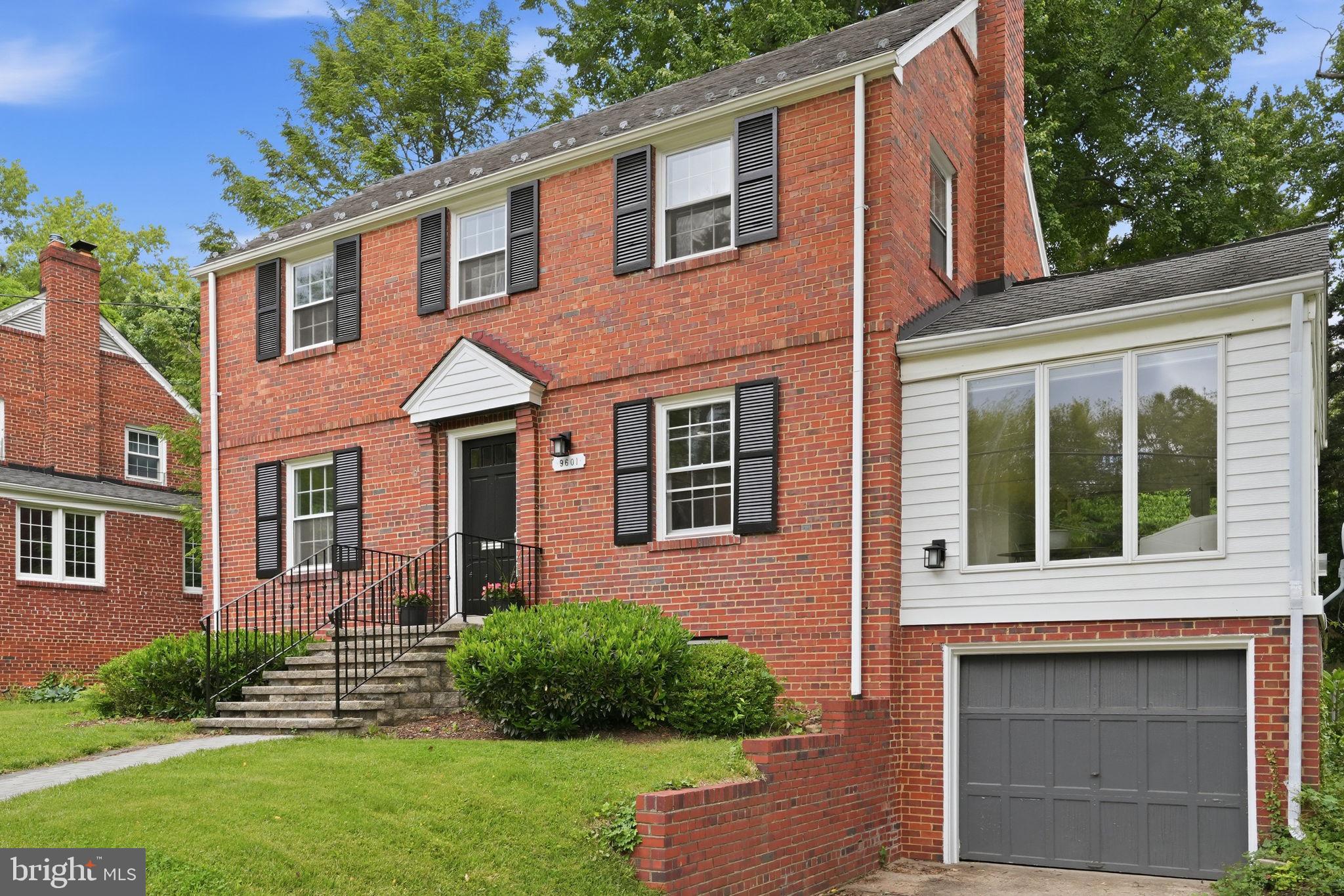9601 Bruce Drive Silver Spring, MD 20901 - Photo 29 of 29 Charming brick home with lush greenery.