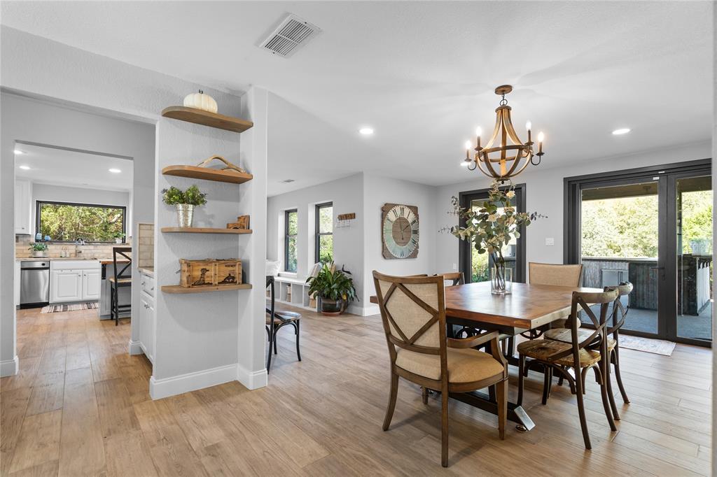 950 Naylor Road Cross Roads, TX 76227 - Photo 13 of 40 a view of a dining room with furniture window and wooden floor