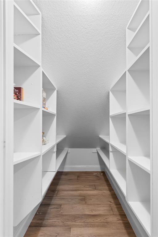 950 Naylor Road Cross Roads, TX 76227 - Photo 17 of 40 a view of walk in closet with empty racks