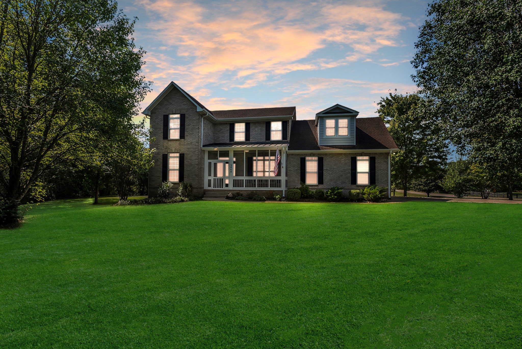3848 Kedron Road Spring Hill, TN 37174 - Photo 1 of 33 a front view of a house with a garden and porch