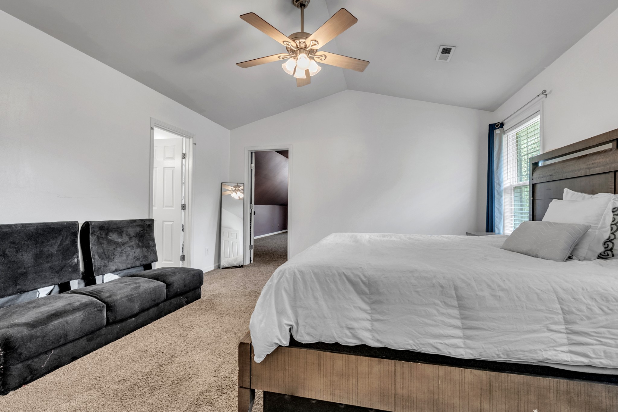 3848 Kedron Road Spring Hill, TN 37174 - Photo 13 of 33 a bedroom with a bed and couch