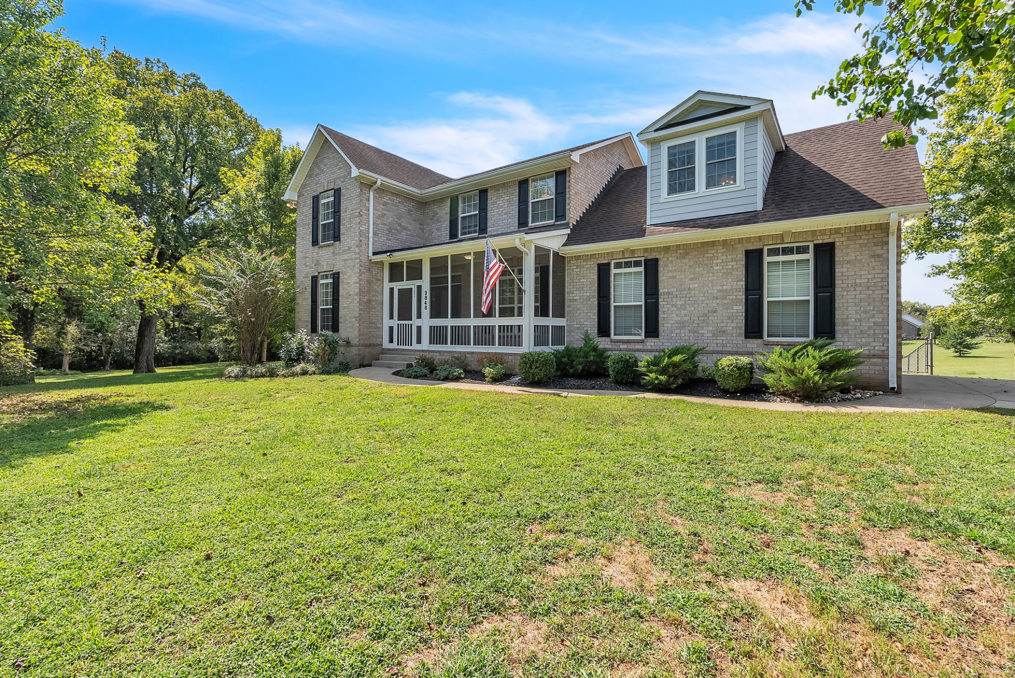 3848 Kedron Road Spring Hill, TN 37174 - Photo 21 of 33 a front view of a house with garden