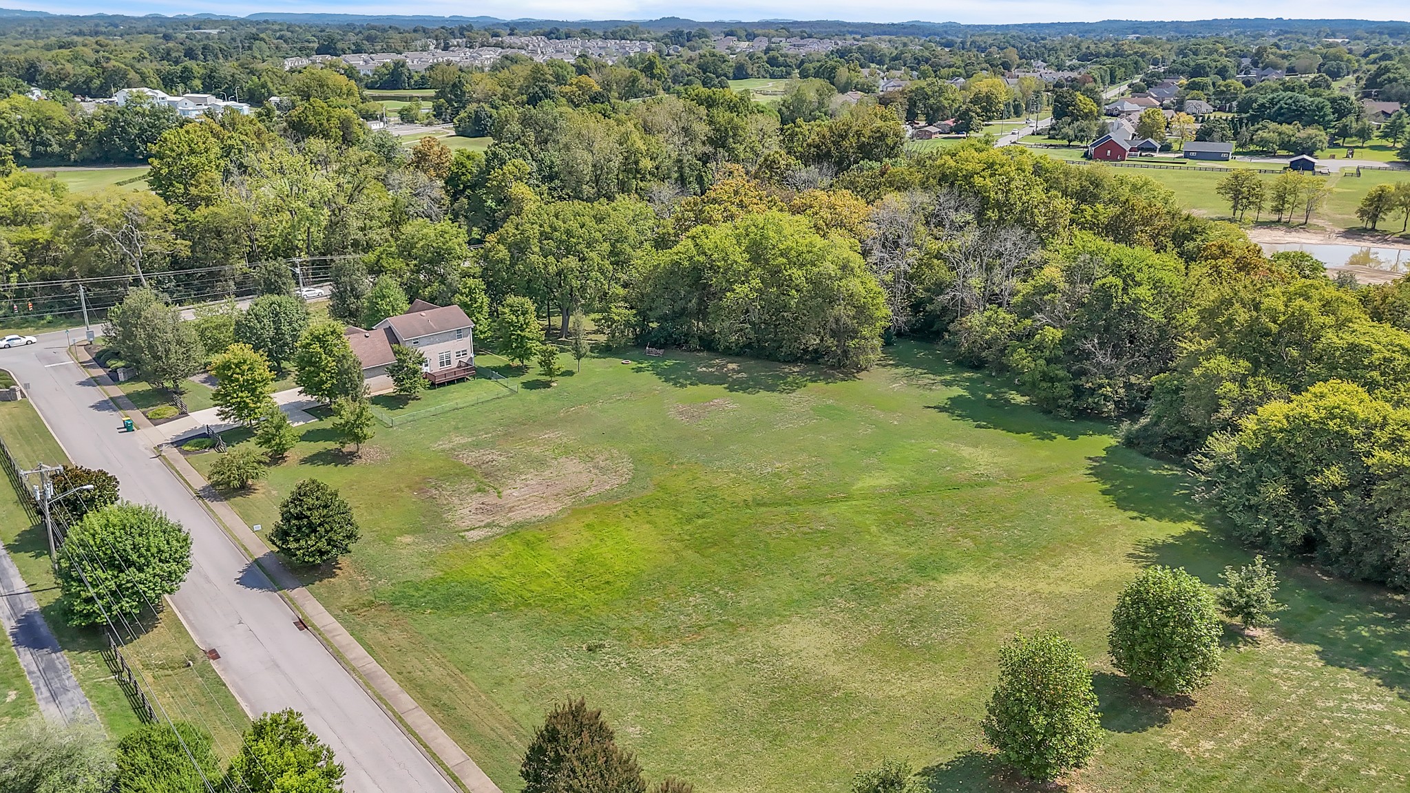 3848 Kedron Road Spring Hill, TN 37174 - Photo 27 of 33 a view of a lake with an outdoor space