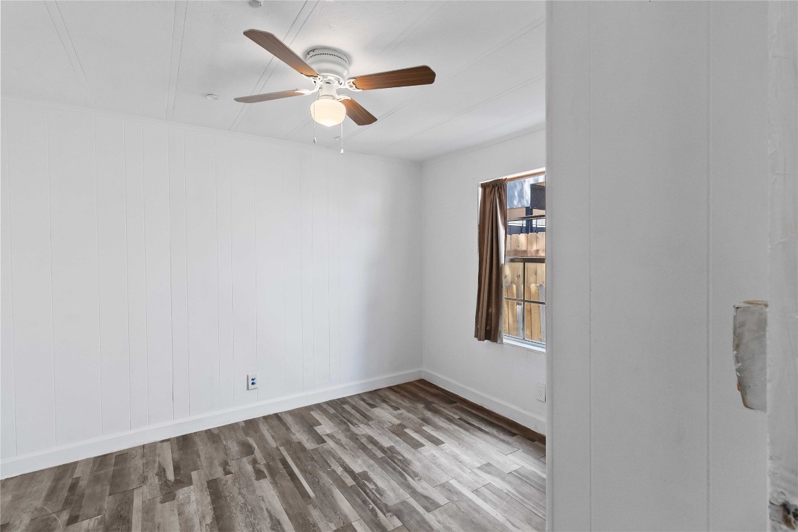 1002 Walter Street Austin, TX 78702 - Photo 21 of 31 an empty room with windows and fan