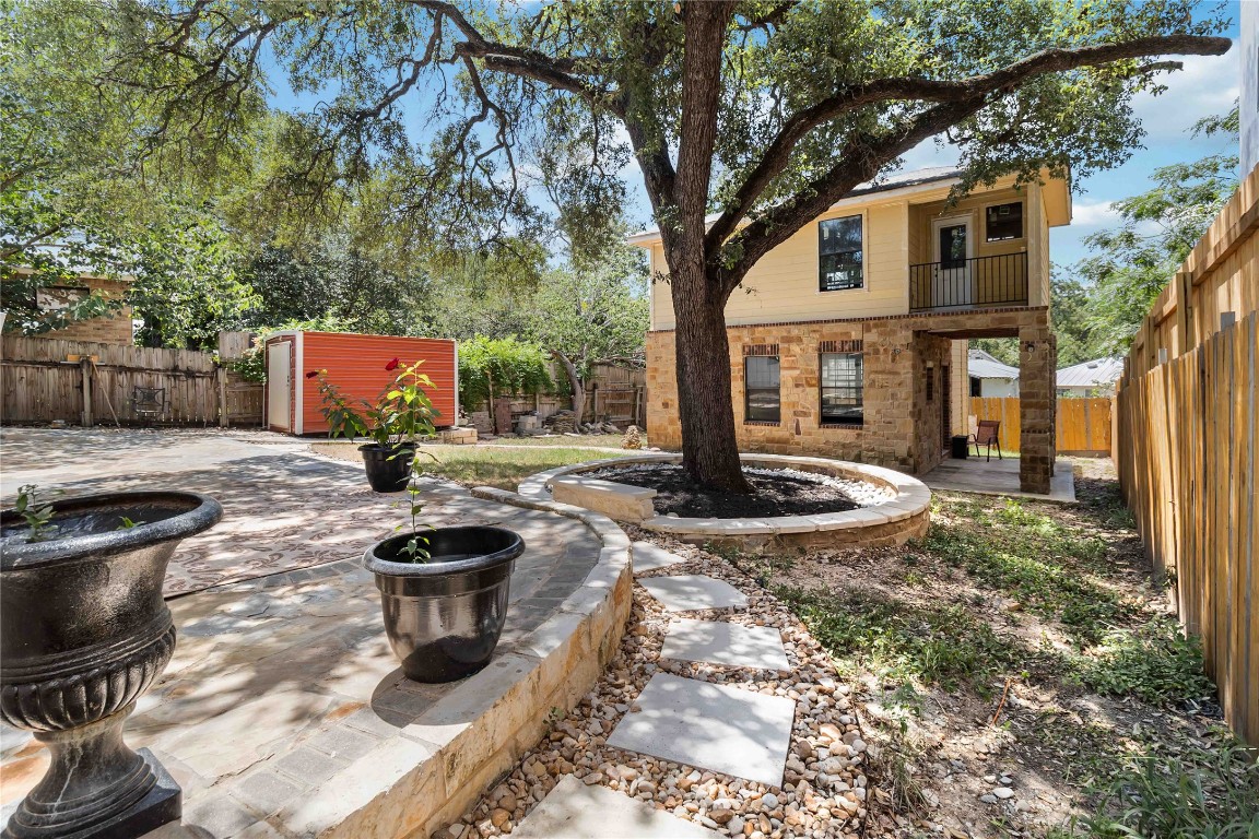 1002 Walter Street Austin, TX 78702 - Photo 28 of 31 a view of a house with backyard and sitting area