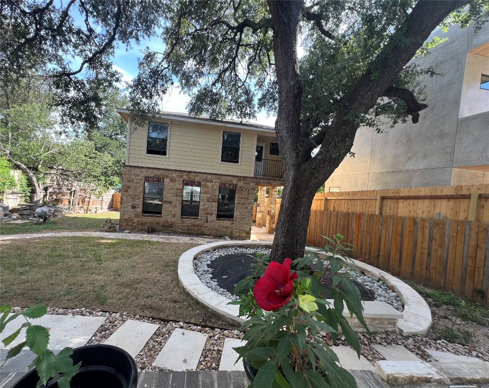 1002 Walter Street Austin, TX 78702 - Photo 30 of 31 a front view of a house with garden
