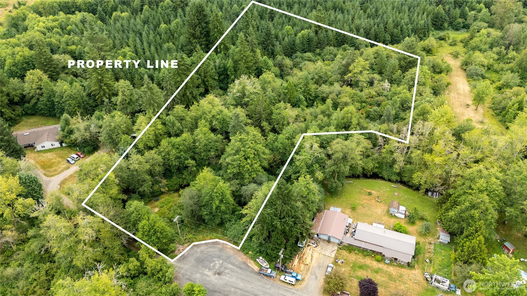 0 Shanklin Road Onalaska, WA 98570 - Photo 2 of 12 a view of a yard and swimming pool