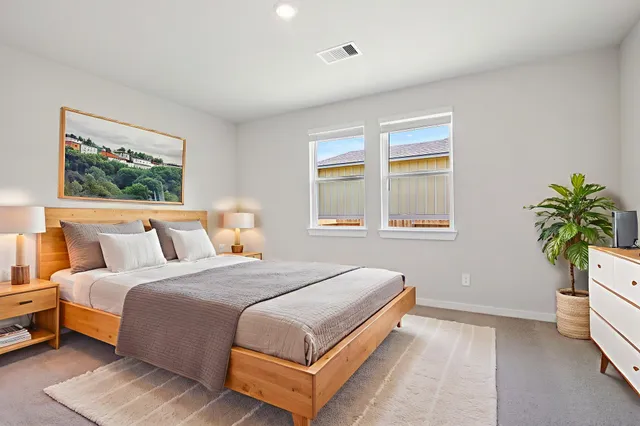 a bathroom with a shower and sink