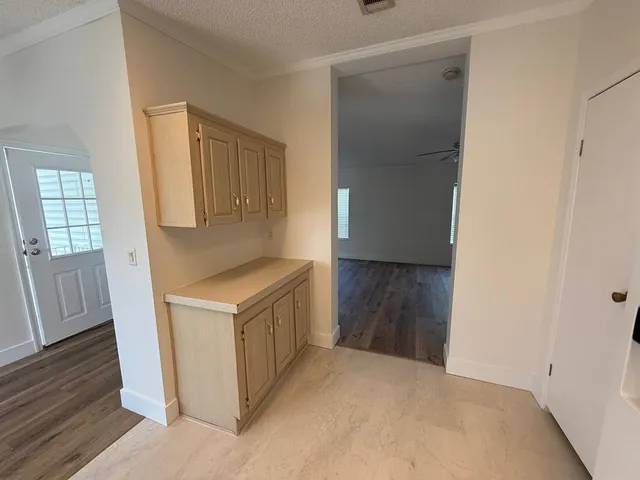 a view of a room with racks on the wall