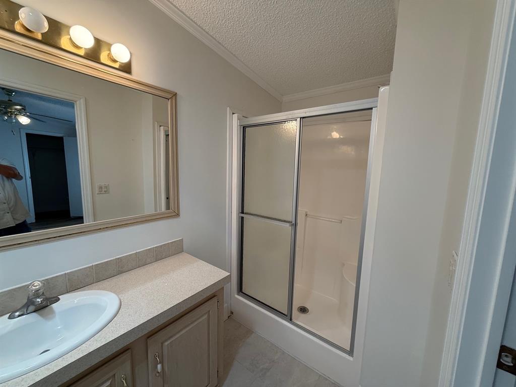 8648 Southwest 16th Place Davie, FL 33324 - Photo 6 of 10 a bathroom with a sink and a mirror