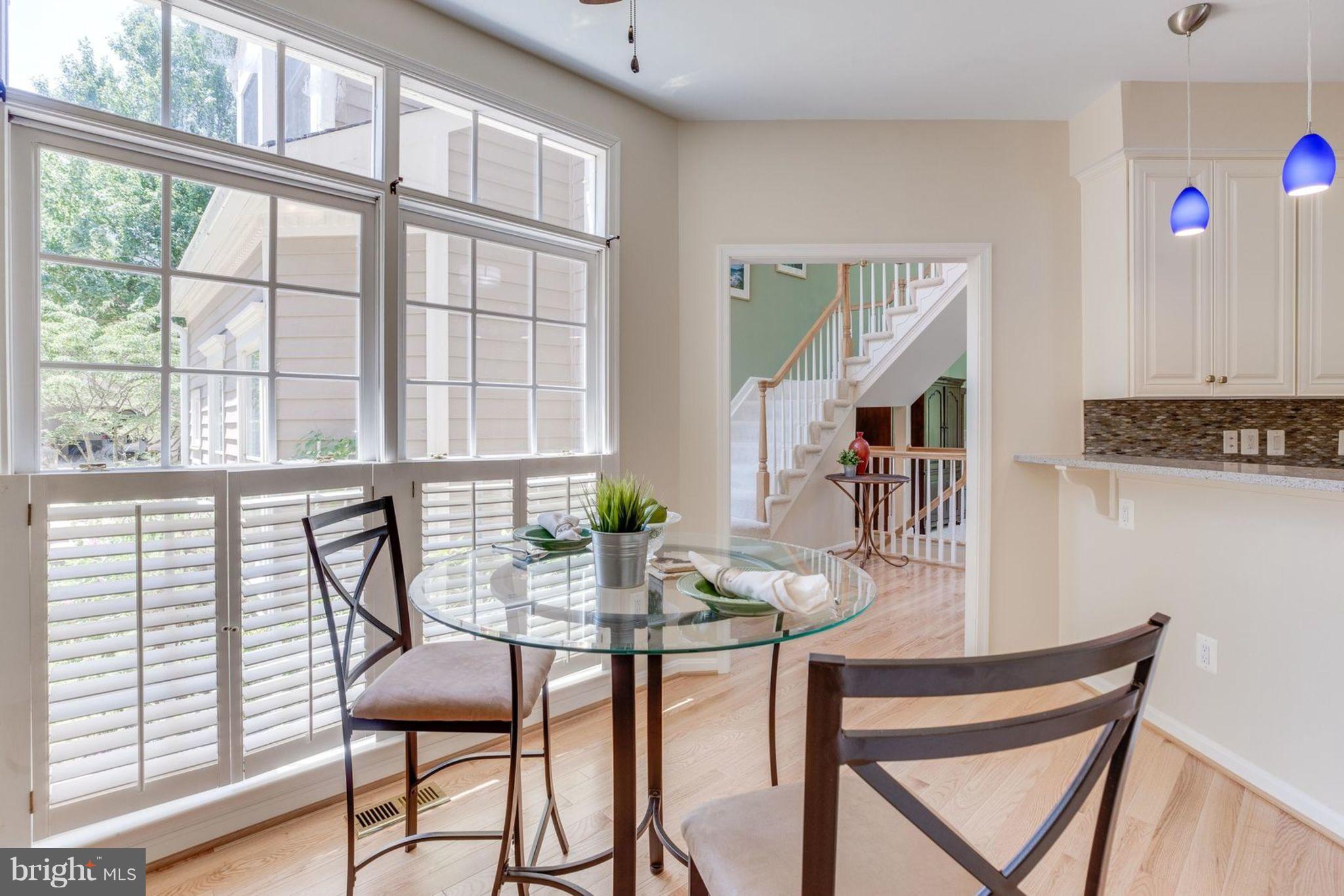 11446 Hollow Timber Court Reston, VA 20194 - Photo 16 of 29 a dining room with furniture and window