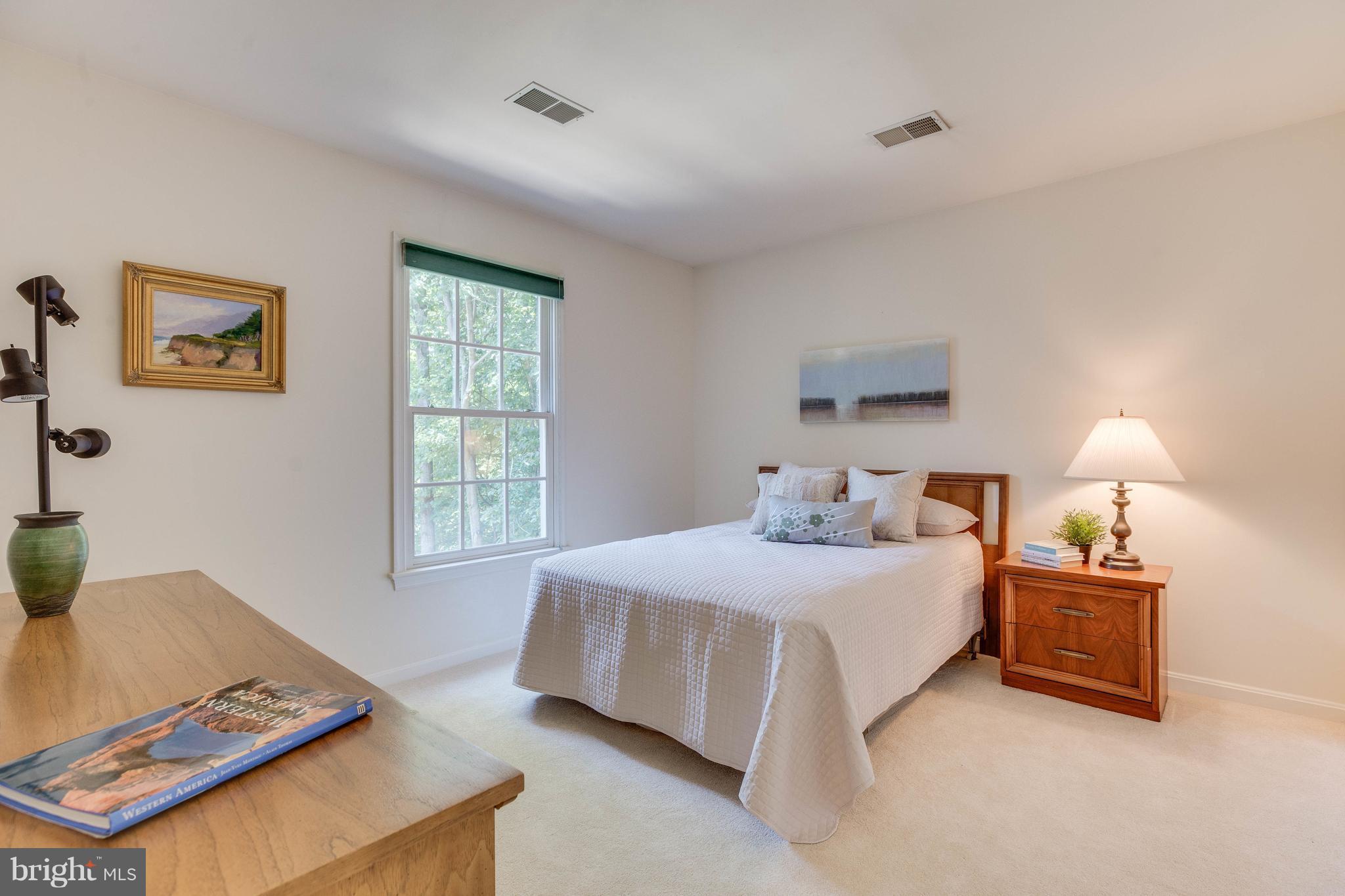 11446 Hollow Timber Court Reston, VA 20194 - Photo 23 of 29 a bedroom with a bed furniture and window