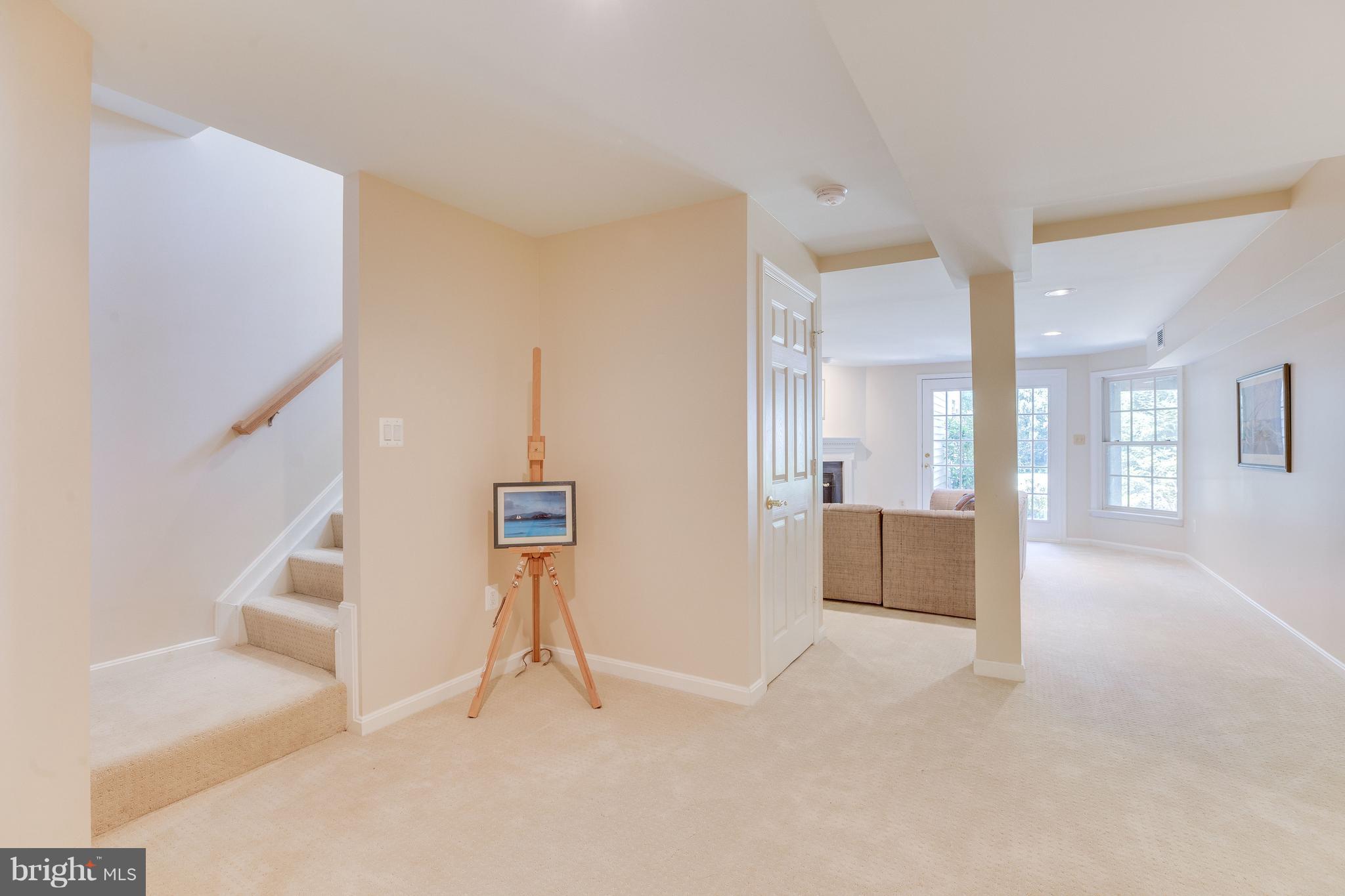 11446 Hollow Timber Court Reston, VA 20194 - Photo 24 of 29 a view of empty room with wooden floor and windows