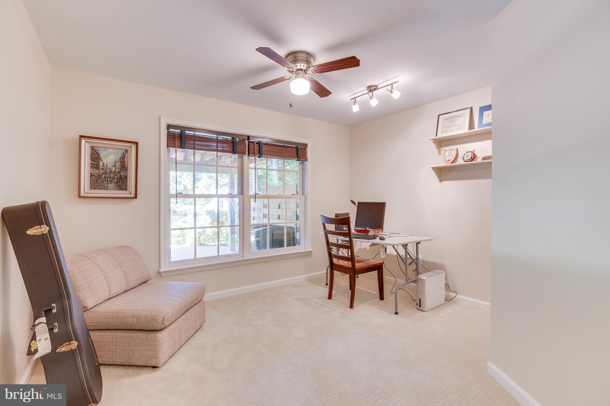 11446 Hollow Timber Court Reston, VA 20194 - Photo 26 of 29 a work room with furniture and a large window