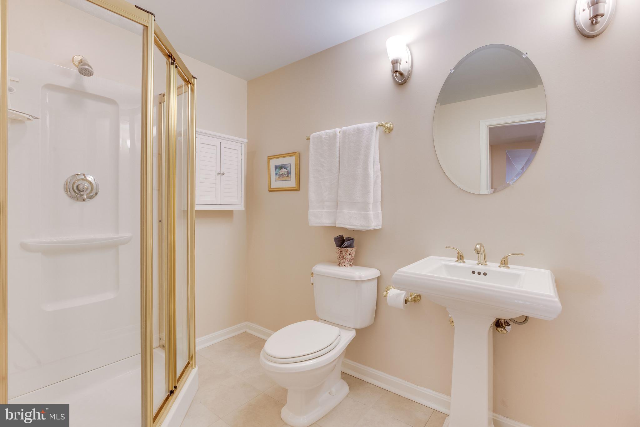 11446 Hollow Timber Court Reston, VA 20194 - Photo 27 of 29 a bathroom with a sink toilet and shower