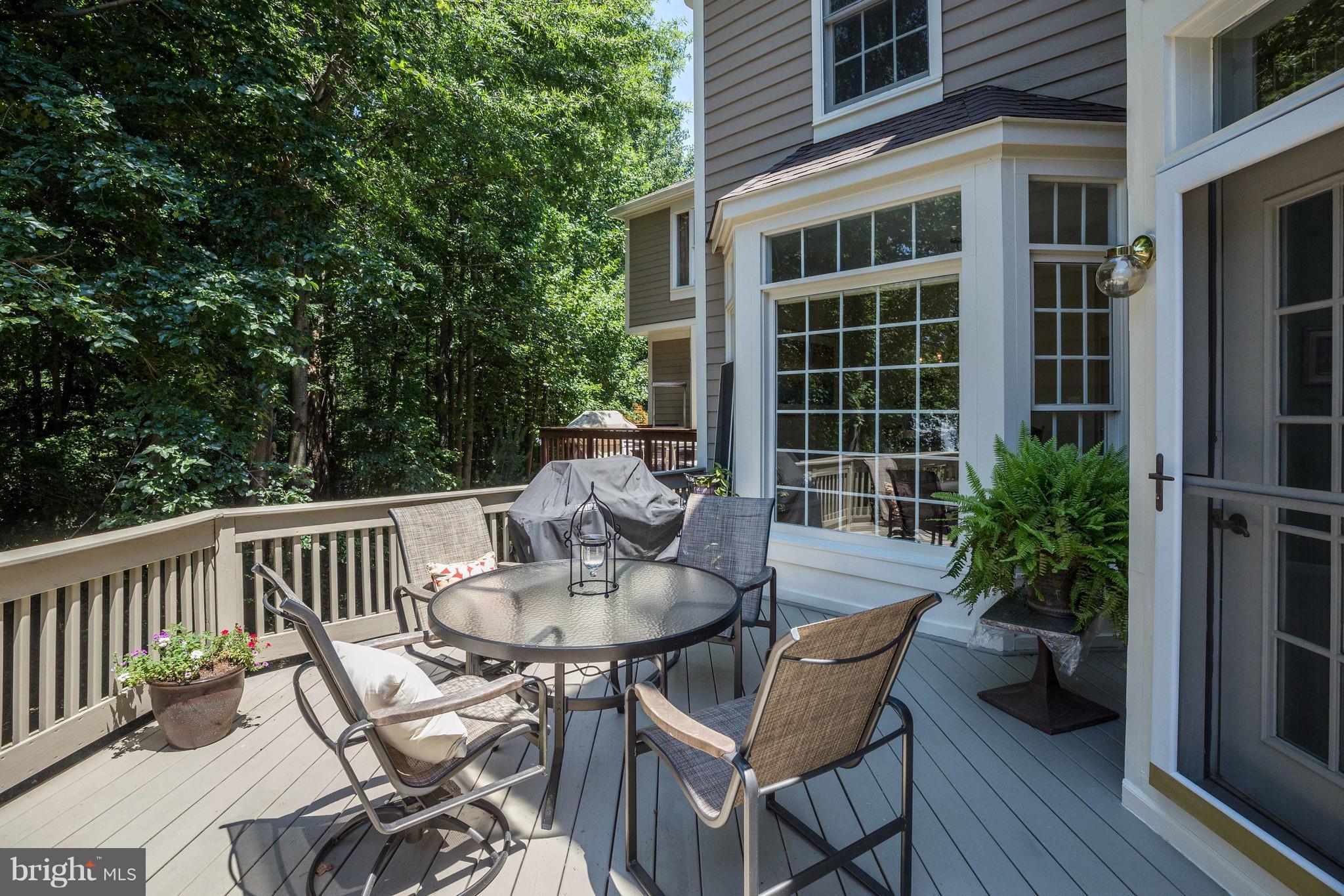 11446 Hollow Timber Court Reston, VA 20194 - Photo 28 of 29 a view of a chair and table in the balcony