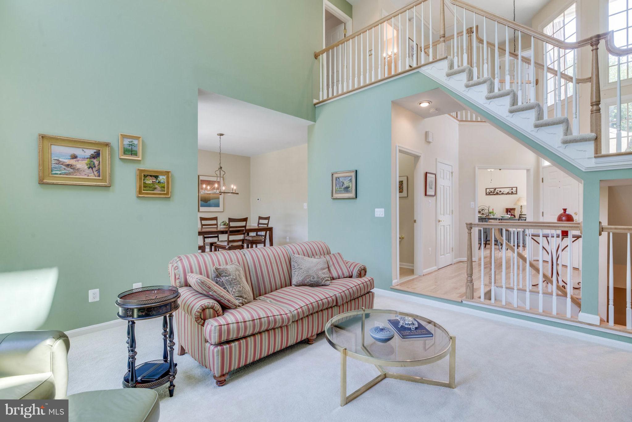 11446 Hollow Timber Court Reston, VA 20194 - Photo 9 of 29 a living room with furniture and a table