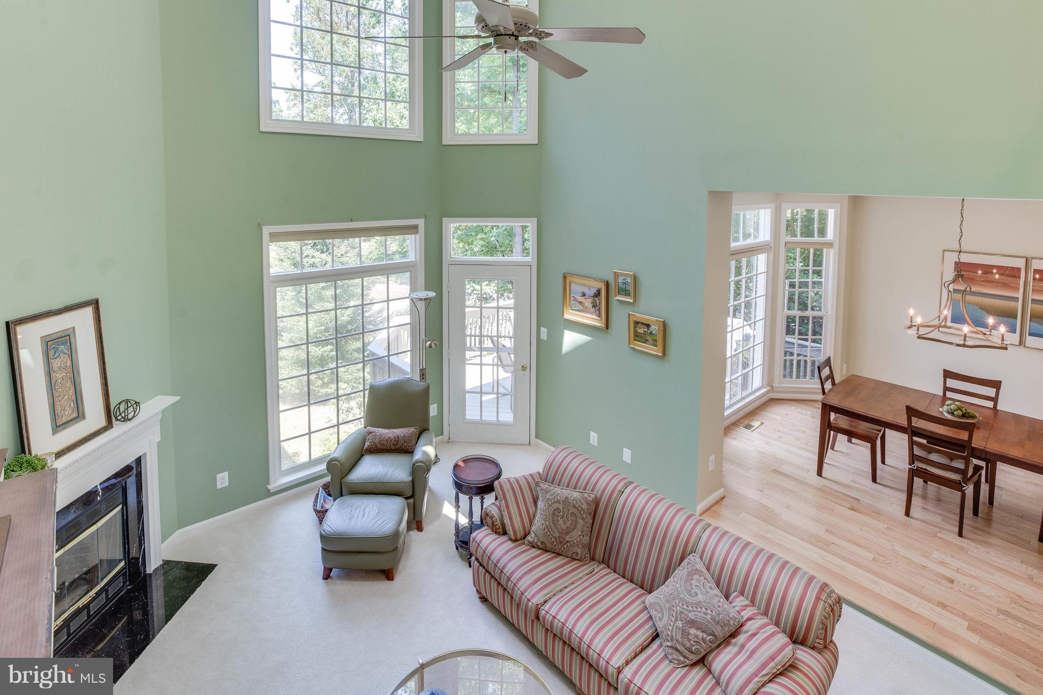 11446 Hollow Timber Court Reston, VA 20194 - Photo 10 of 29 a living room with furniture and a window