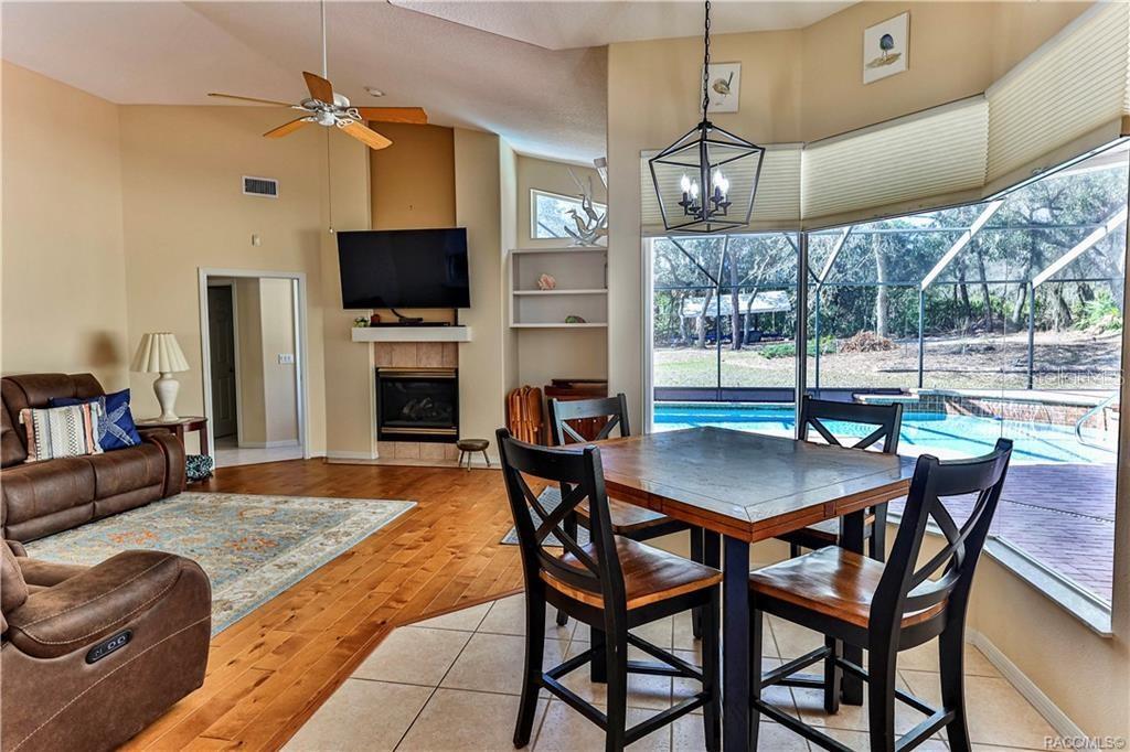 5420 North Rosedale Circle Beverly Hills, FL 34465 - Photo 15 of 49 a living room with fireplace furniture and a flat screen tv