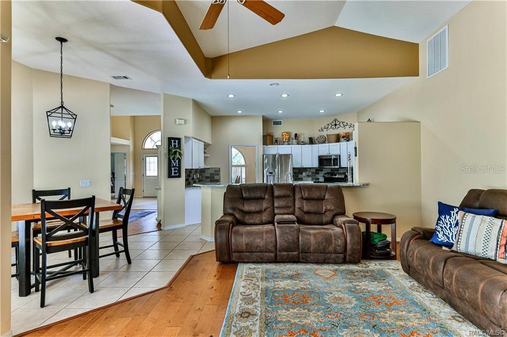 5420 North Rosedale Circle Beverly Hills, FL 34465 - Photo 17 of 49 a living room with furniture and wooden floor