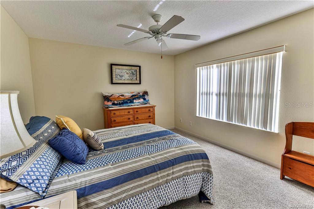 5420 North Rosedale Circle Beverly Hills, FL 34465 - Photo 29 of 49 a bedroom with furniture and windows