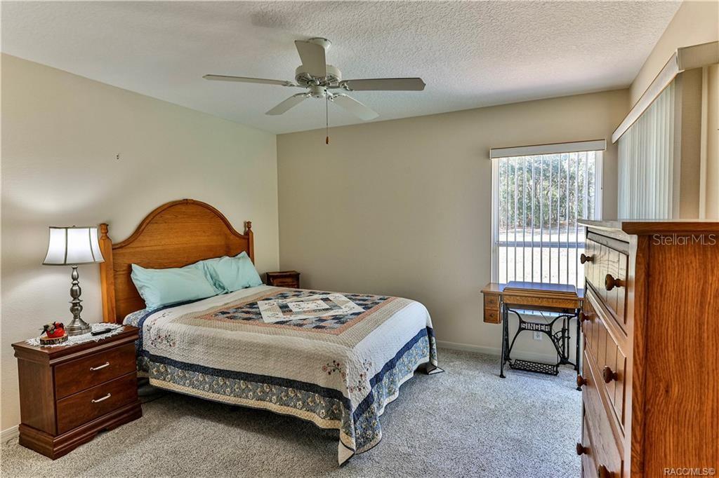 5420 North Rosedale Circle Beverly Hills, FL 34465 - Photo 30 of 49 a bedroom with a bed and a window