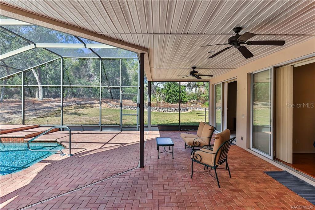 5420 North Rosedale Circle Beverly Hills, FL 34465 - Photo 37 of 49 a view of a entertaining space with furniture and backyard