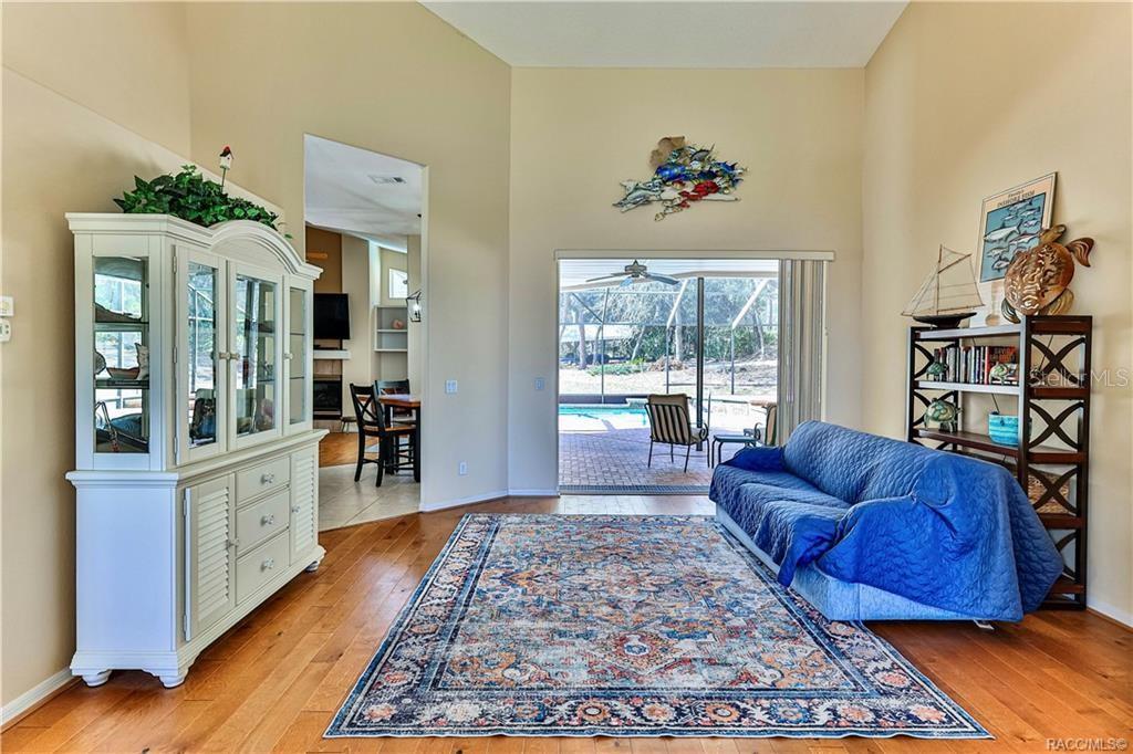 5420 North Rosedale Circle Beverly Hills, FL 34465 - Photo 4 of 49 a living room with furniture and a rug
