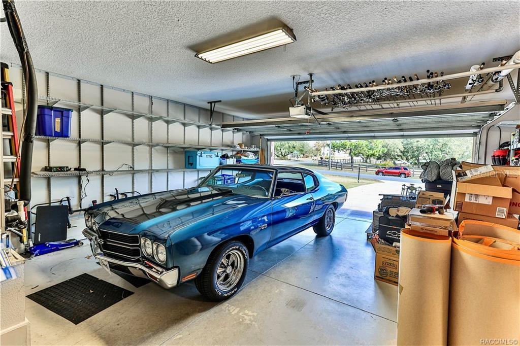 5420 North Rosedale Circle Beverly Hills, FL 34465 - Photo 41 of 49 a car parked in a room