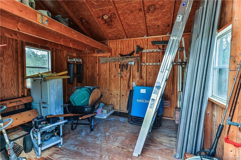 5420 North Rosedale Circle Beverly Hills, FL 34465 - Photo 45 of 49 a view of an chairs in the balcony