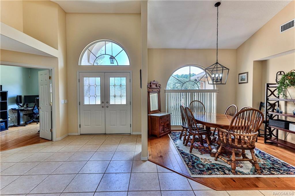 5420 North Rosedale Circle Beverly Hills, FL 34465 - Photo 8 of 49 a view of a chairs and table in a patio