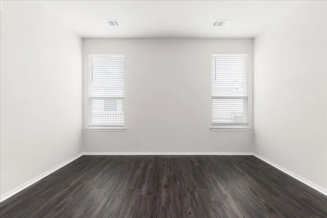 a kitchen with granite countertop a stove top oven and sink