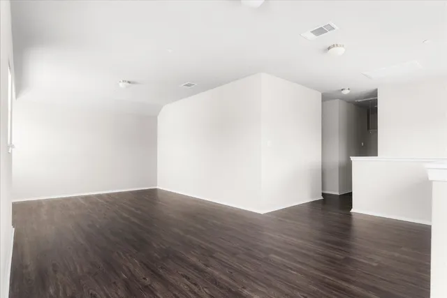 a bathroom with a shower and a sink