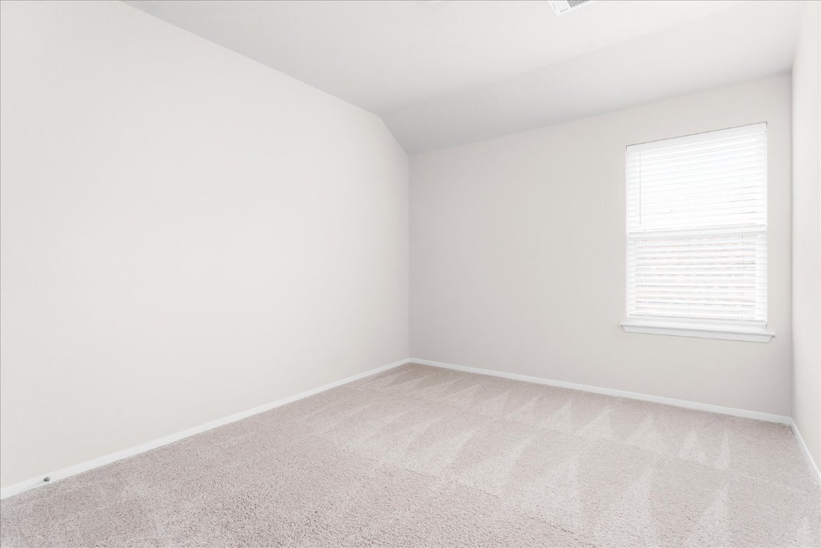 2800 Joe Dimaggio Boulevard, Unit 100 Round Rock, TX 78665 - Photo 21 of 33 an empty room with a window