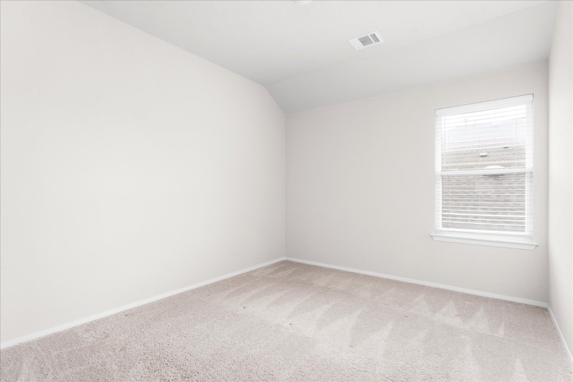 2800 Joe Dimaggio Boulevard, Unit 100 Round Rock, TX 78665 - Photo 27 of 33 an empty room with a window