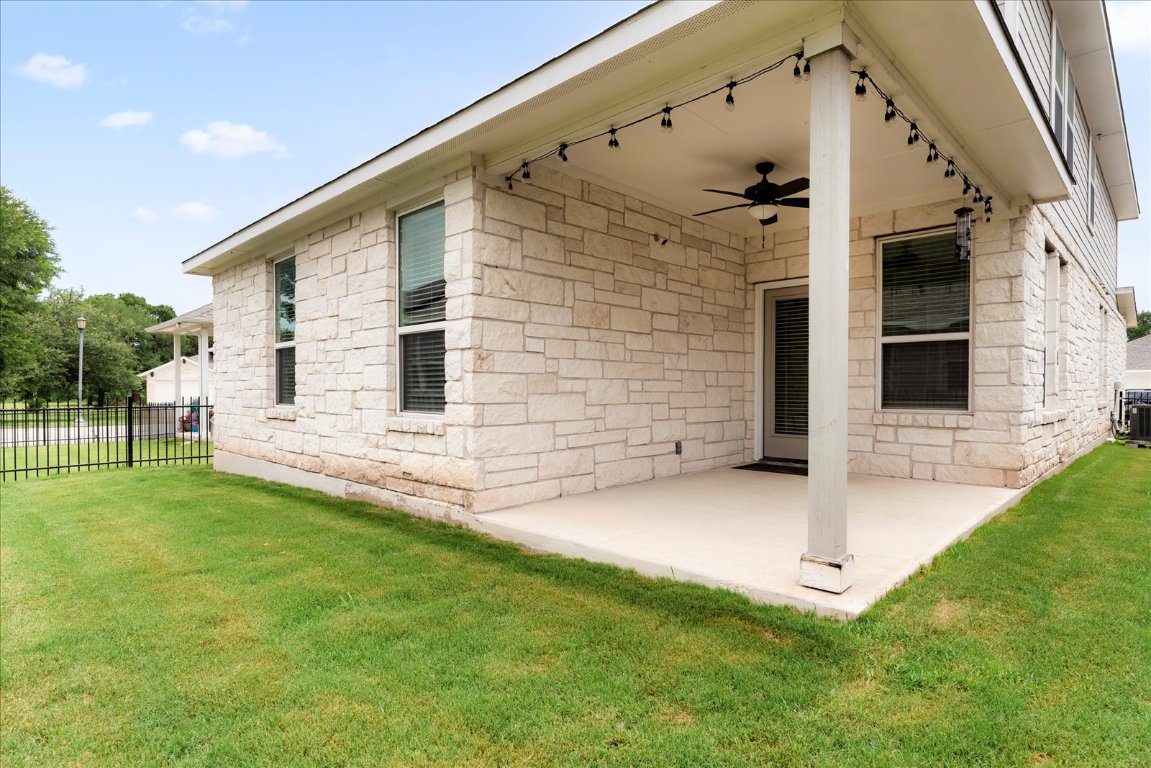 2800 Joe Dimaggio Boulevard, Unit 100 Round Rock, TX 78665 - Photo 30 of 33 a view of front of house with a yard