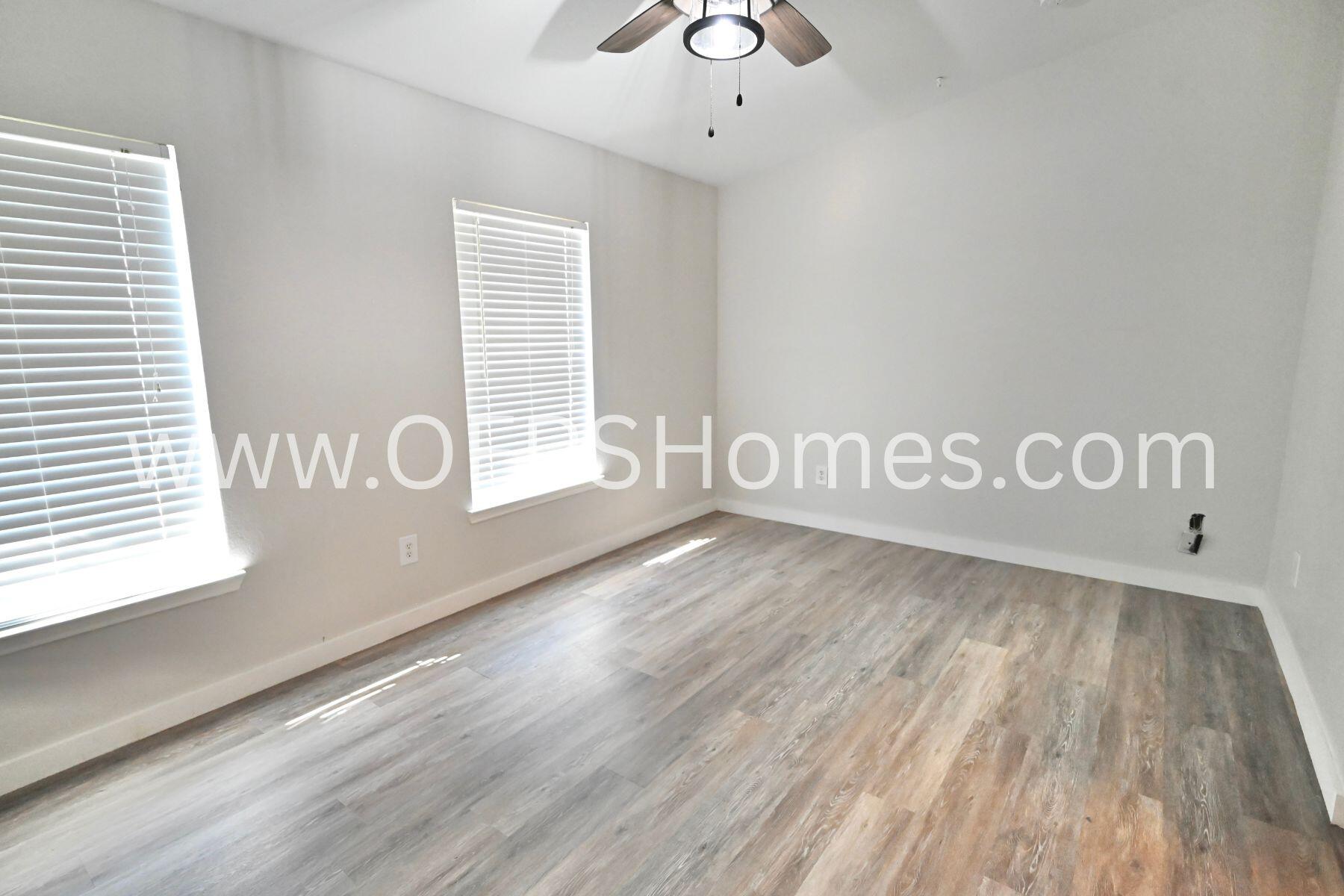 4030 Dancing Cloud Court, Unit 346 Destin, FL 32541 - Photo 16 of 19 a view of wooden floor and windows in a room